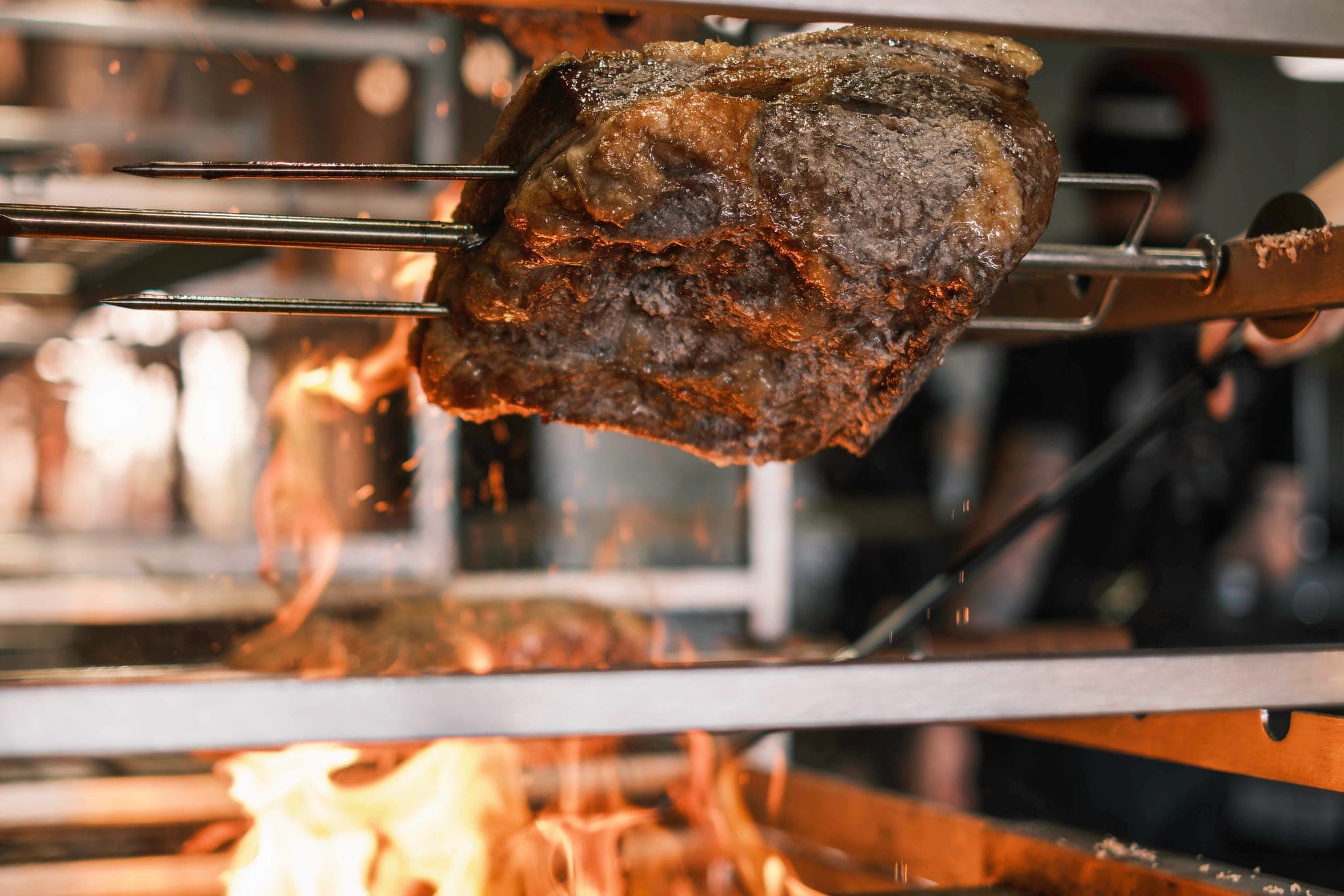 Aberdeen Angus beef roasting on the open fire at The Copse.
